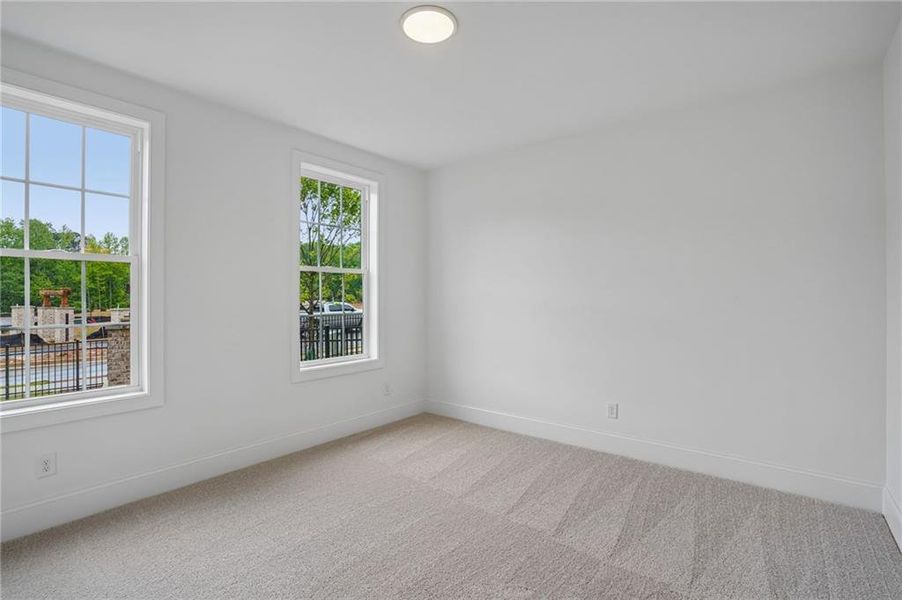 Spacious, unfurnished interior of a new home in Waterhaven, Cumming (Image 15).