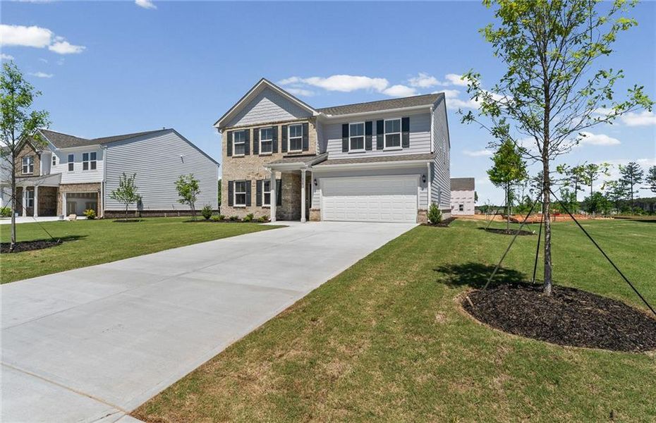 Front exterior of a new home in Anderson Point, McDonough, GA, highlighting curb appeal (Image 21).