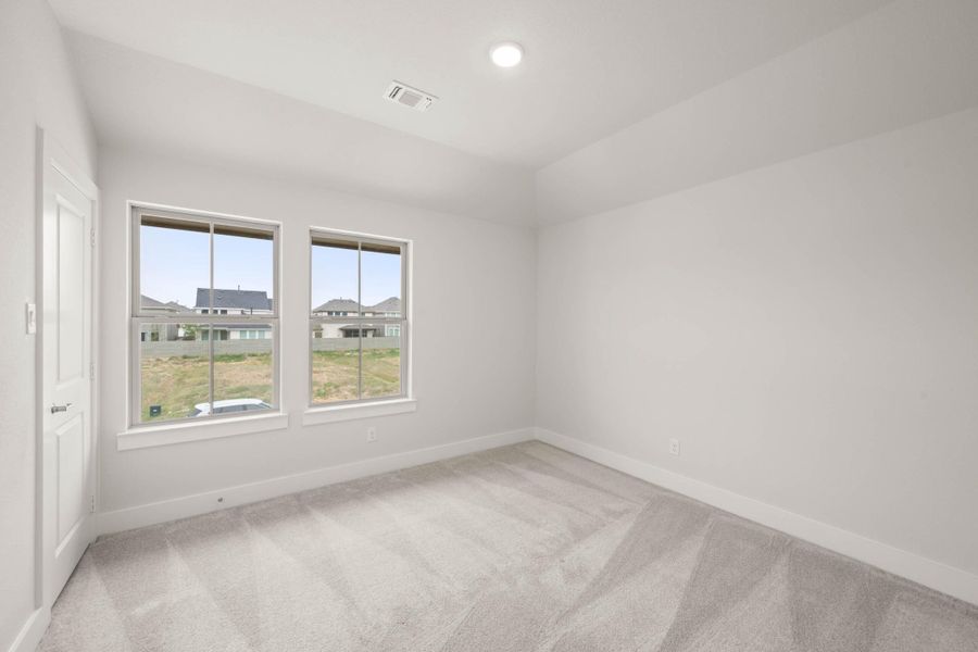 Spacious, unfurnished interior of a new home in Cottage Collection at Harvest, Argyle (Image 24).