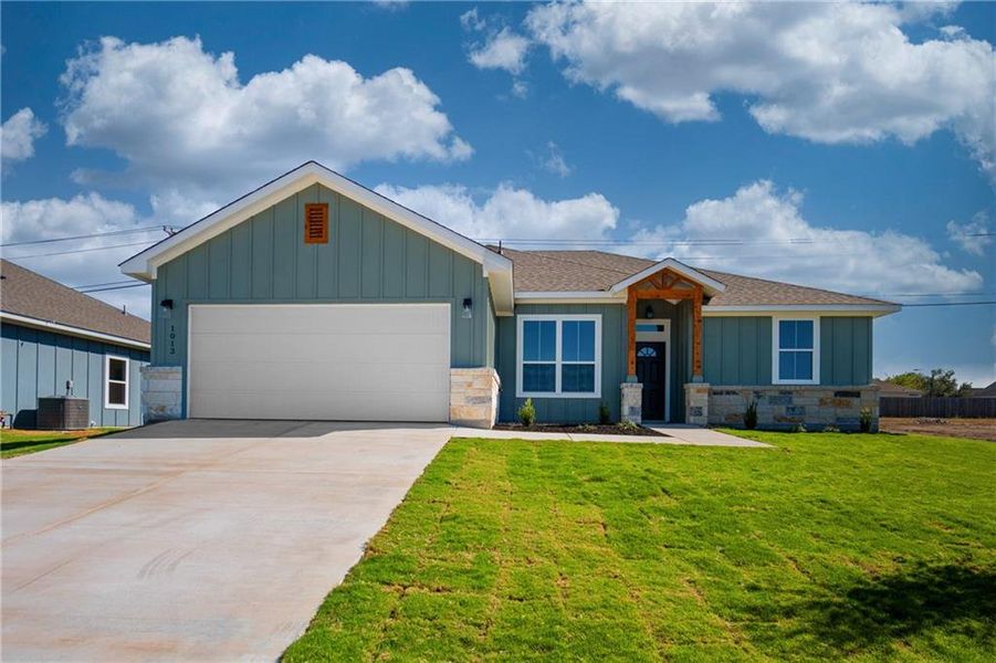 Front exterior of a new home in , Temple, TX, highlighting curb appeal (Image 21).