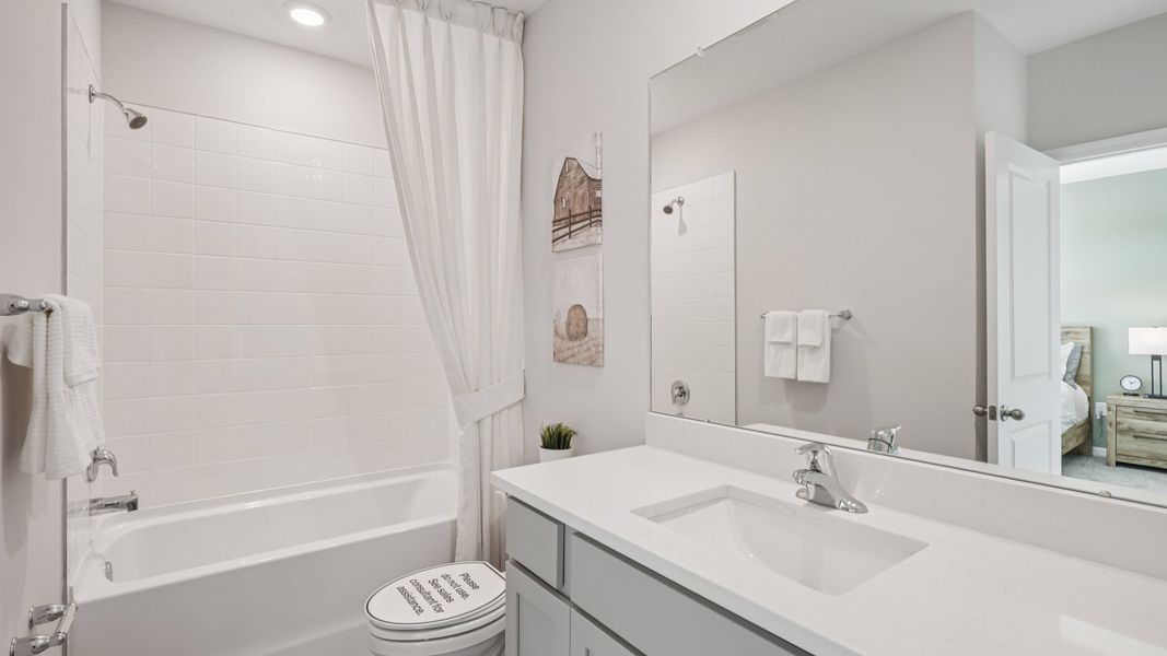 Representative furnished interior of a home built from the Vale by D.R. Horton in Meadow Ridge at Epperson, Wesley Chapel (Image 22).