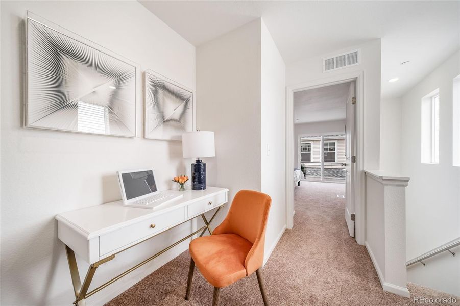 Furnished interior view inside a new home in Reunion, Commerce City (Image 16).