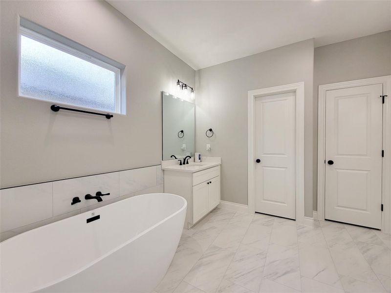 Furnished interior view inside a new home in , Conroe (Image 18).