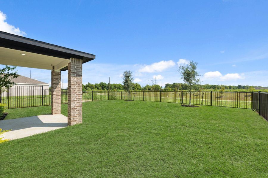 Exterior details and patio area of a home in River Ranch Trails, Dayton (Image 3).