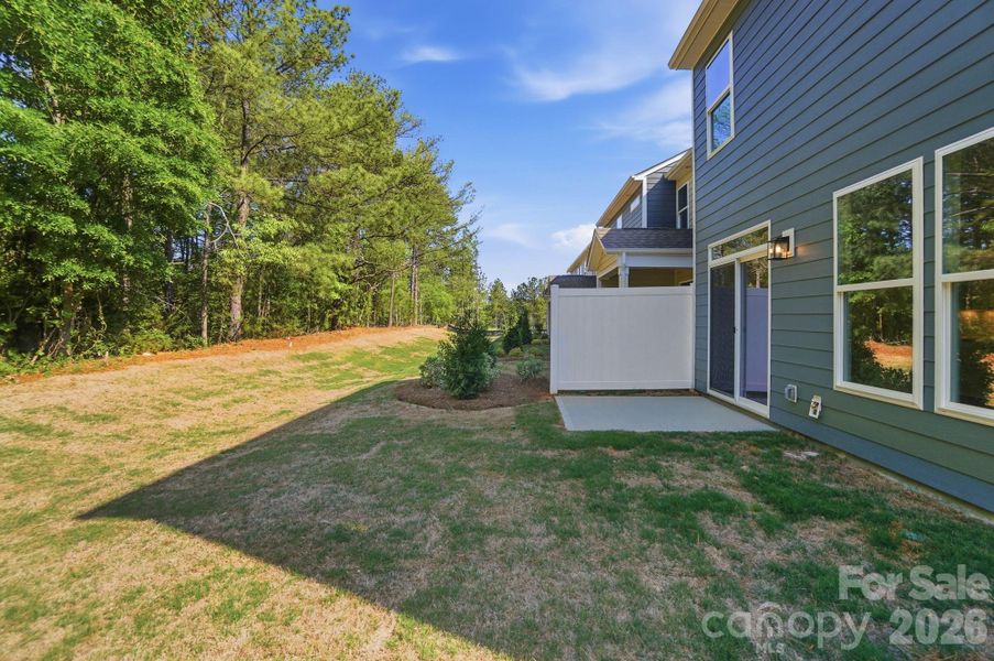 Exterior details and patio area of a home in Blythe Mill Townhomes, Waxhaw (Image 24). Exterior details and patio area of a home in Blythe Mill Townhomes, Waxhaw (Image 24).