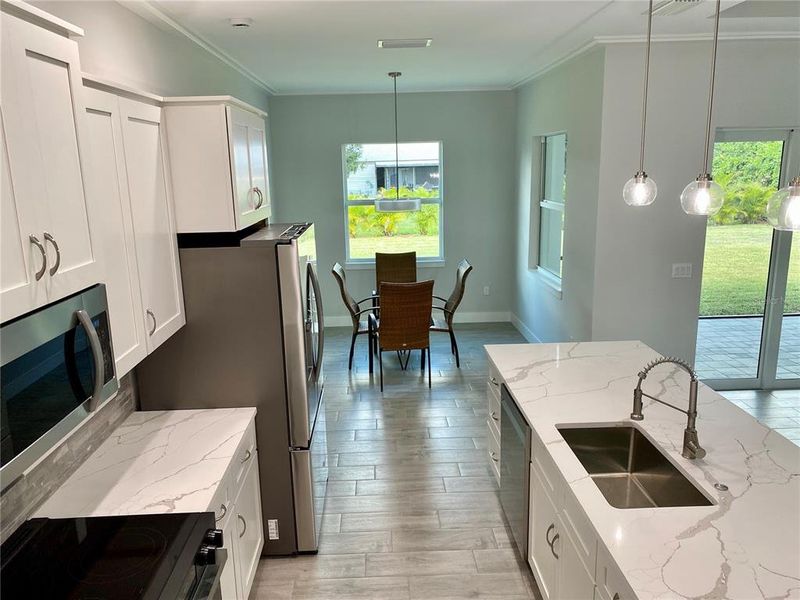 Furnished interior view inside a new home in , Port Charlotte (Image 18).