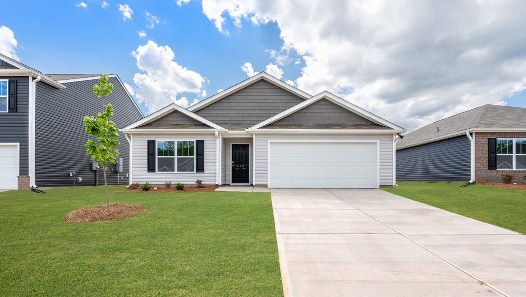 Front exterior of a new home in Lakestone, Woodruff, SC, highlighting curb appeal (Image 1). Front exterior of a new home in Lakestone, Woodruff, SC, highlighting curb appeal (Image 1).