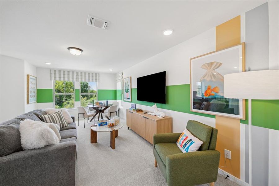 Carpeted interior space featuring recessed lighting and a flush-mount ceiling fixture