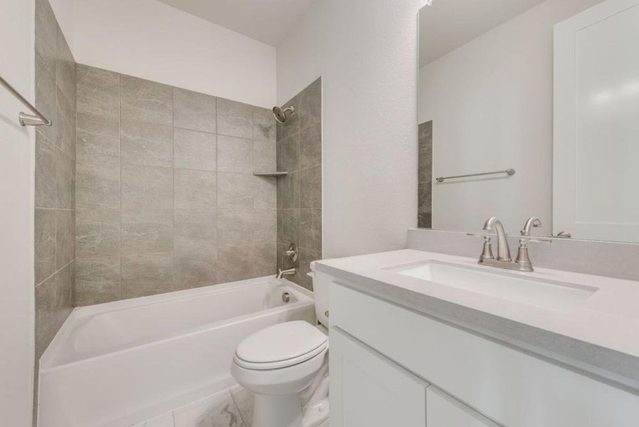 Furnished interior view inside a new home in Dominion of Pleasant Valley, Wylie (Image 16).