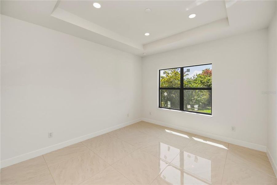 Spacious, unfurnished interior of a new home in , Port Charlotte (Image 23).