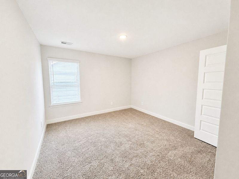 Spacious, unfurnished interior of a new home in Harley Farms South, Bonaire (Image 24). Spacious, unfurnished interior of a new home in Harley Farms South, Bonaire (Image 24).