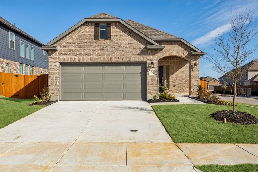 Front exterior of a new home in Heartland, Heartland, TX, highlighting curb appeal (Image 12). Front exterior of a new home in Heartland, Heartland, TX, highlighting curb appeal (Image 12).