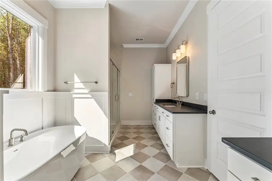 Primary bath - Images are of a different home with