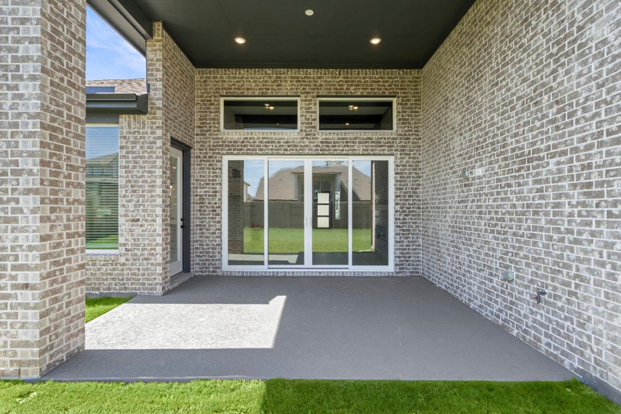 Exterior details and patio area of a home in Elyson, Katy (Image 1). Exterior details and patio area of a home in Elyson, Katy (Image 1).
