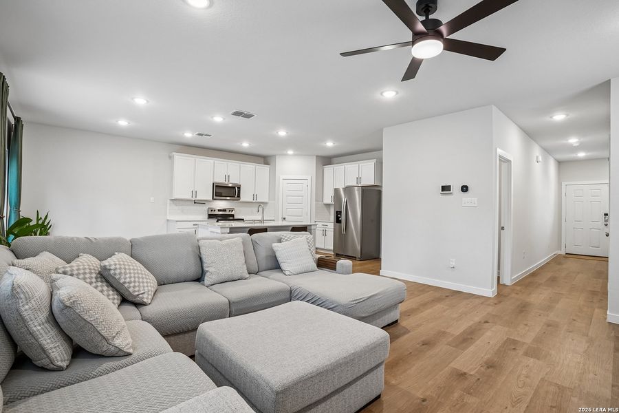 Furnished interior view inside a new home in University Village, San Antonio (Image 12).