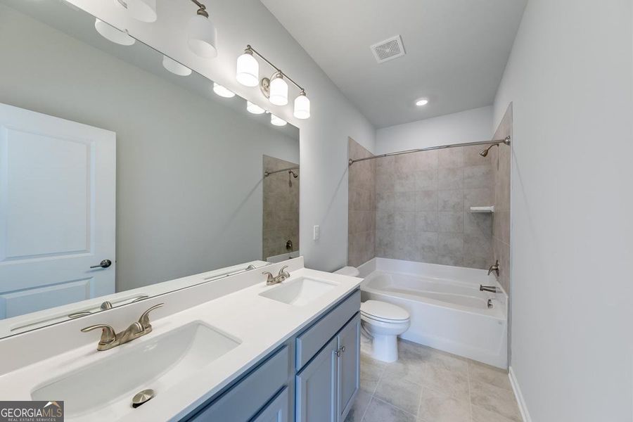 Furnished interior view inside a new home in Chimney Oaks Townhomes, Homer (Image 7). Furnished interior view inside a new home in Chimney Oaks Townhomes, Homer (Image 7).