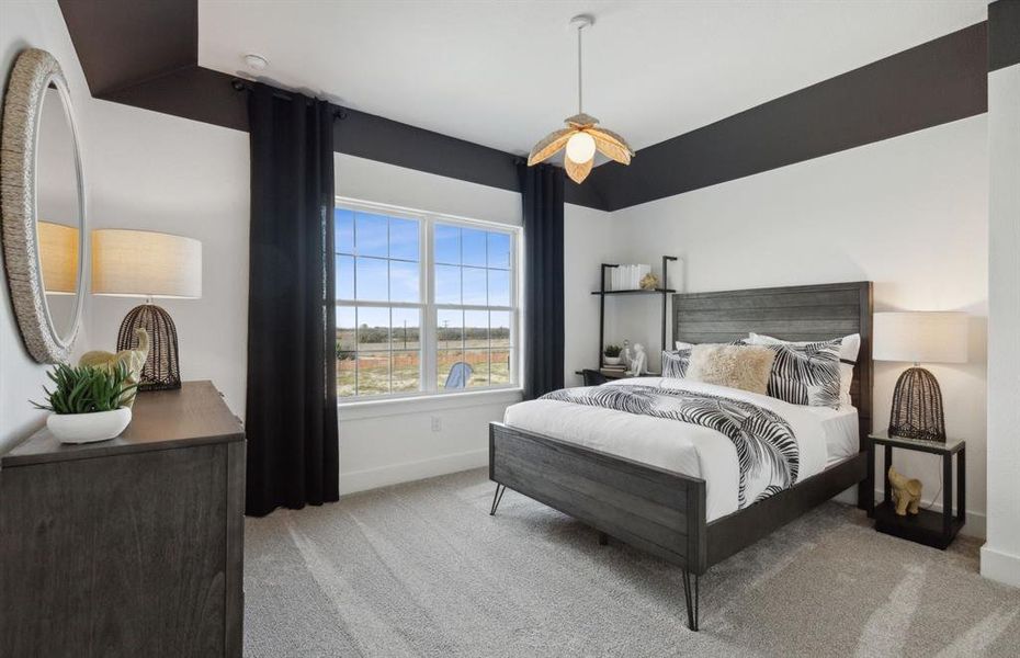 *actual home, furniture not included- Spacious secondary bedroom with large windows