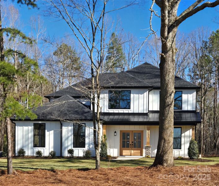 Front exterior of a new home in , Waxhaw, NC, highlighting curb appeal (Image 20). Front exterior of a new home in , Waxhaw, NC, highlighting curb appeal (Image 20).