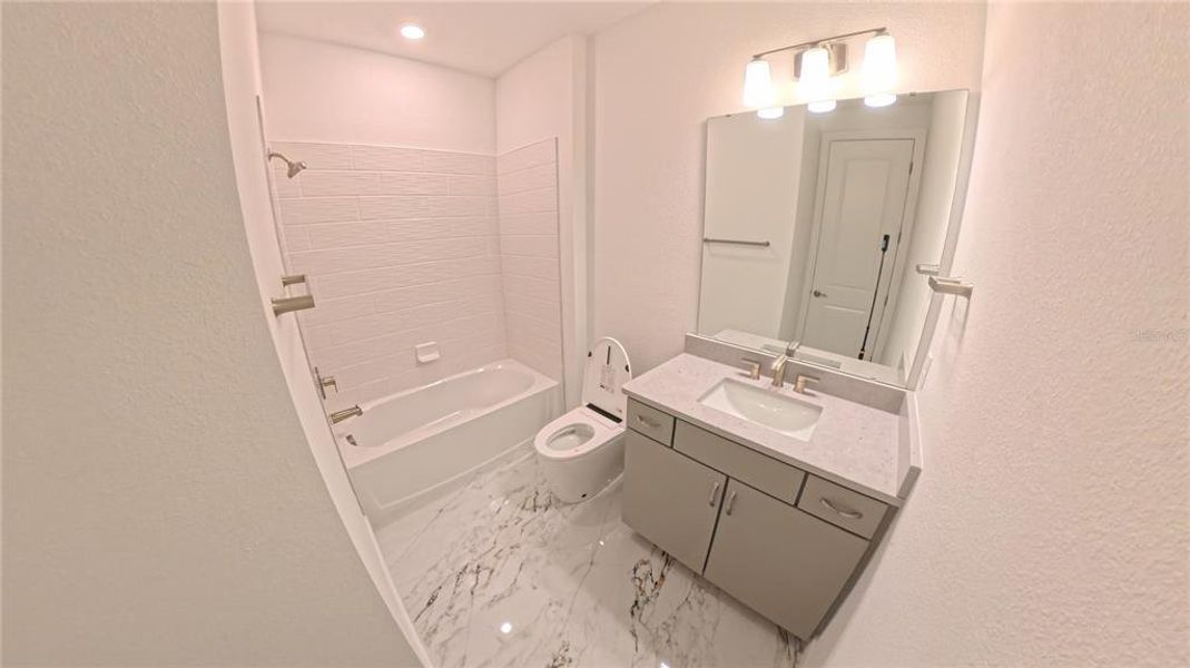 Furnished interior view inside a new home in Willow Ridge, Montverde (Image 11).