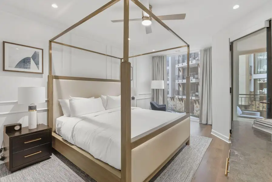 Bedroom featuring wood finished floors, a ceiling fan, and recessed lighting