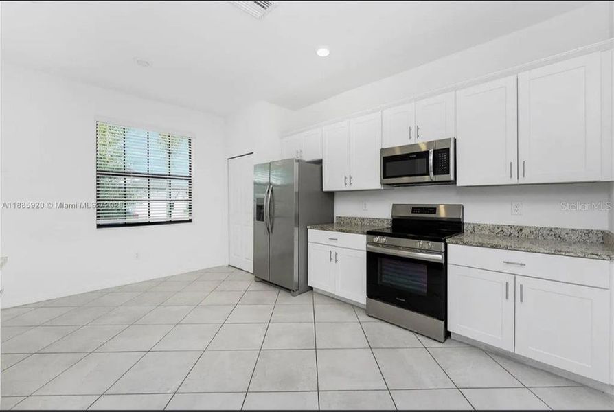 Furnished interior view inside a new home in , Port Charlotte (Image 9).