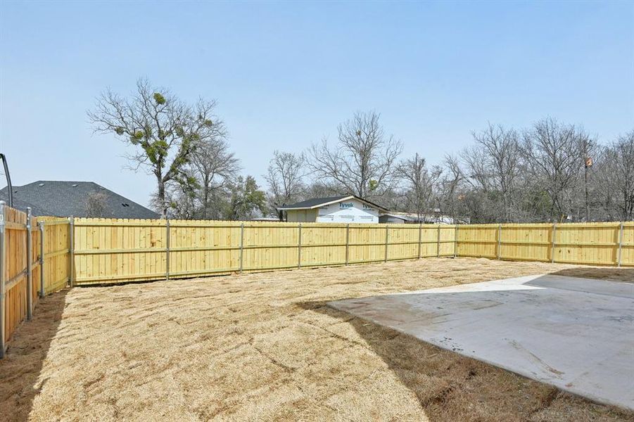 View of yard with a patio area and a fenced backyard