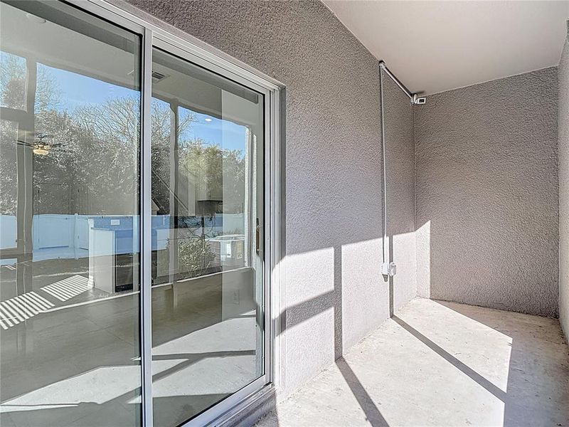 Exterior details and patio area of a home in , Land O' Lakes (Image 18).