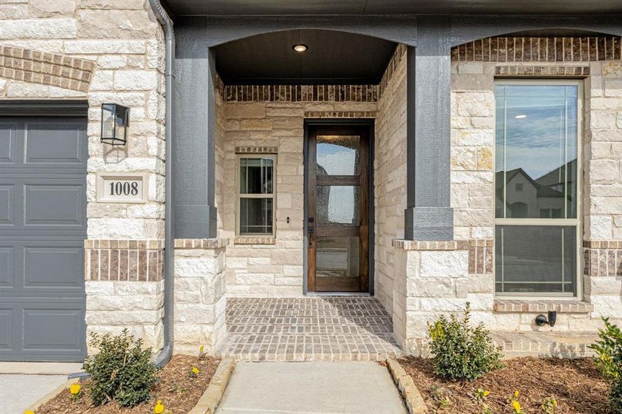 Exterior details and patio area of a home in Timberbrook, Justin (Image 4).