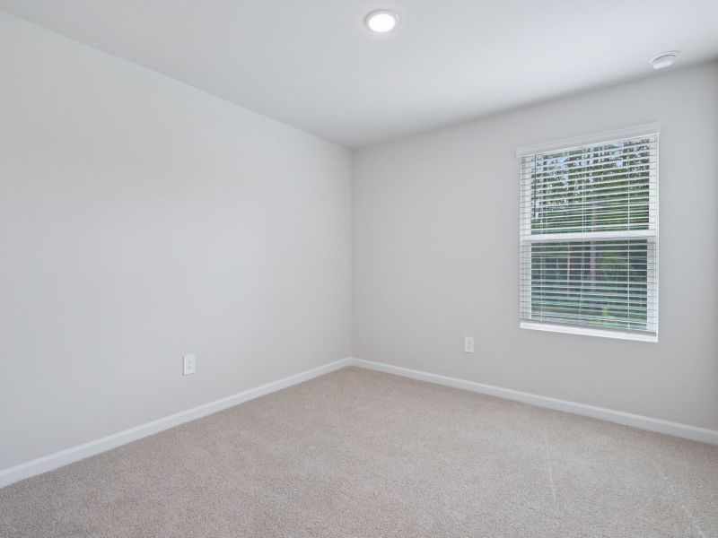 Spacious, unfurnished interior of a new home in The Rows at Buffaloe Reserve, Raleigh (Image 17).