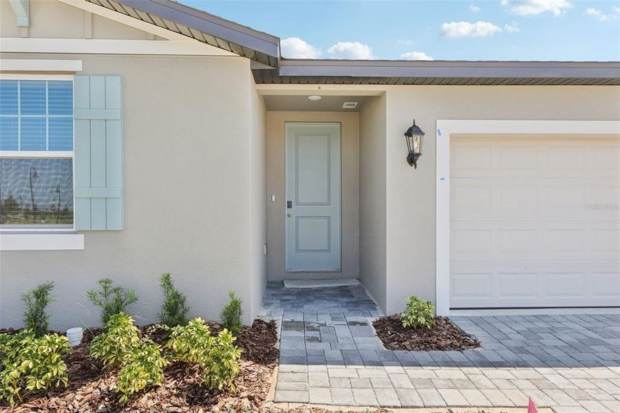 Exterior details and patio area of a home in Crosswinds - Signature Series, Haines City (Image 24).
