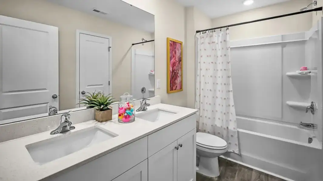 Furnished interior view inside a new home in North Village Townes, Greensboro (Image 21).