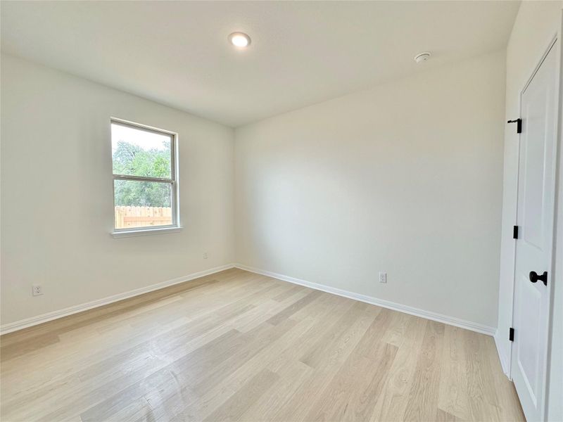 Spacious, unfurnished interior of a new home in Sage Hollow, Kyle (Image 15).