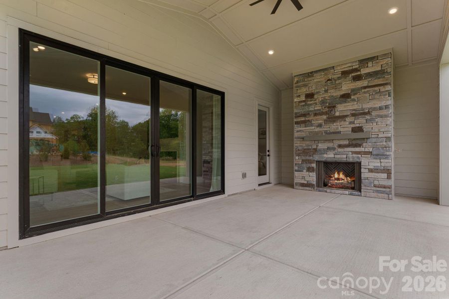 Exterior details and patio area of a home in Bluffs at Wesley Chapel, Waxhaw (Image 3).