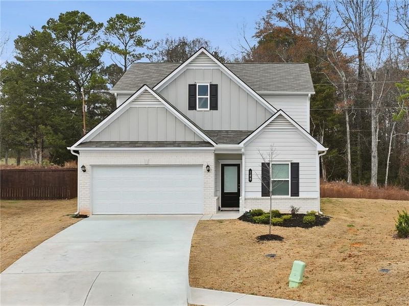 Front exterior of a new home in , Cartersville, GA, highlighting curb appeal (Image 21).