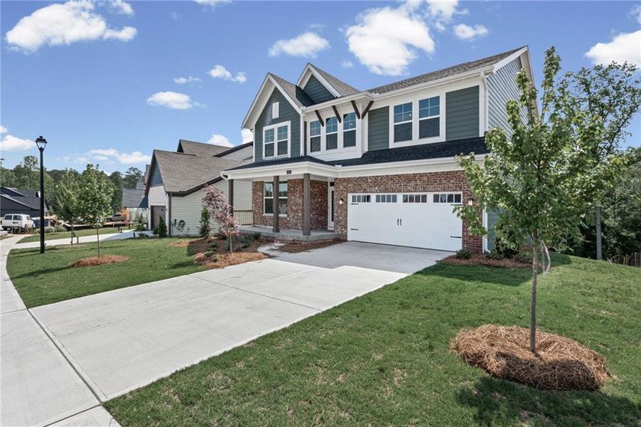 Front exterior of a new home in Twin Lakes, Hoschton, GA, highlighting curb appeal (Image 27).