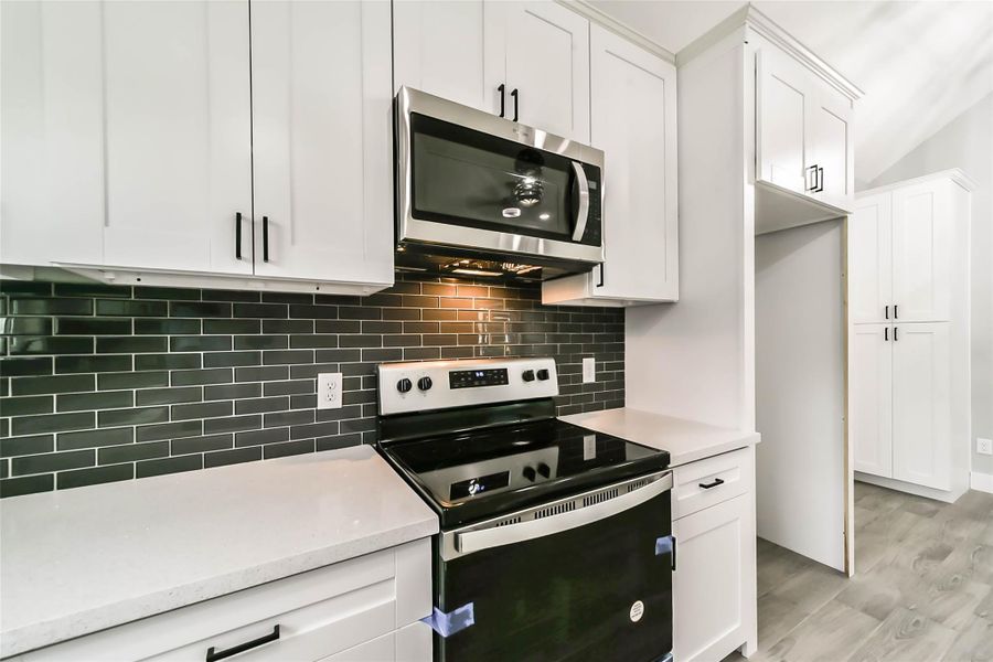 Furnished interior view inside a new home in , Conroe (Image 4).