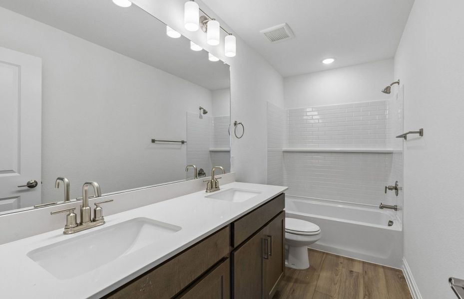 Furnished interior view inside a new home in Treeline, Justin (Image 6).