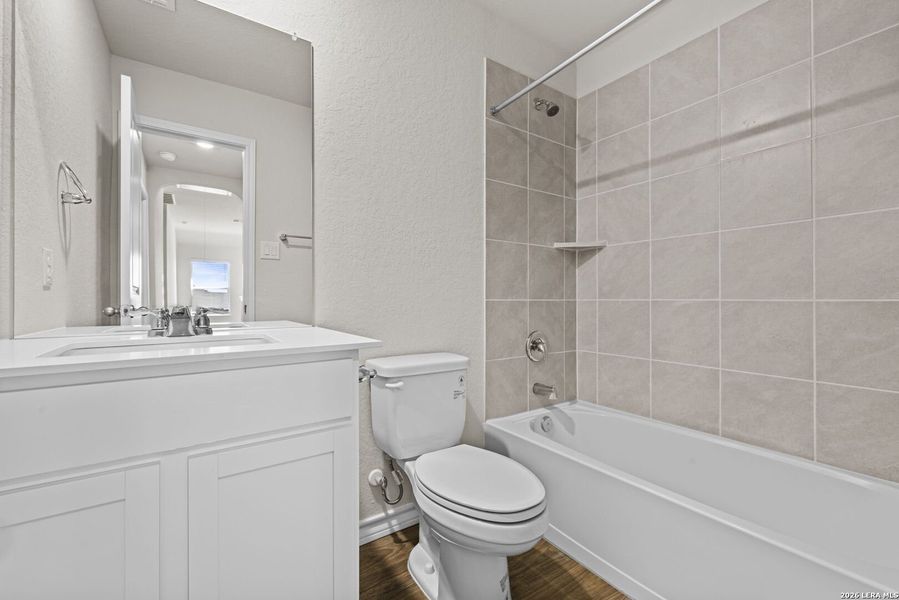 Furnished interior view inside a new home in Redbird Ranch, San Antonio (Image 9).