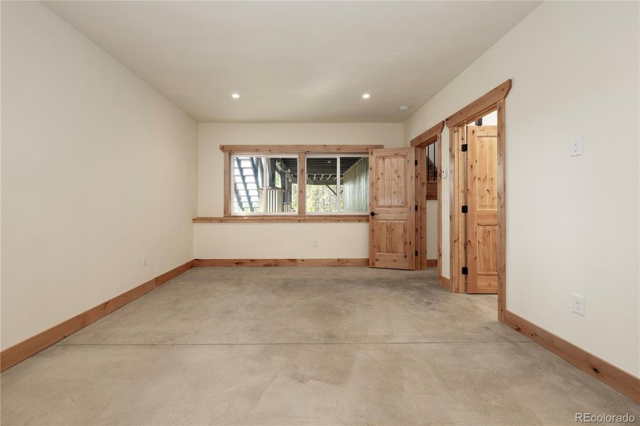 Basement primary bedroom
