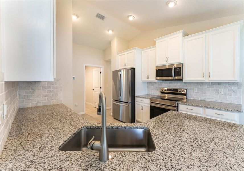 Furnished interior view inside a new home in , Palm Coast (Image 13).
