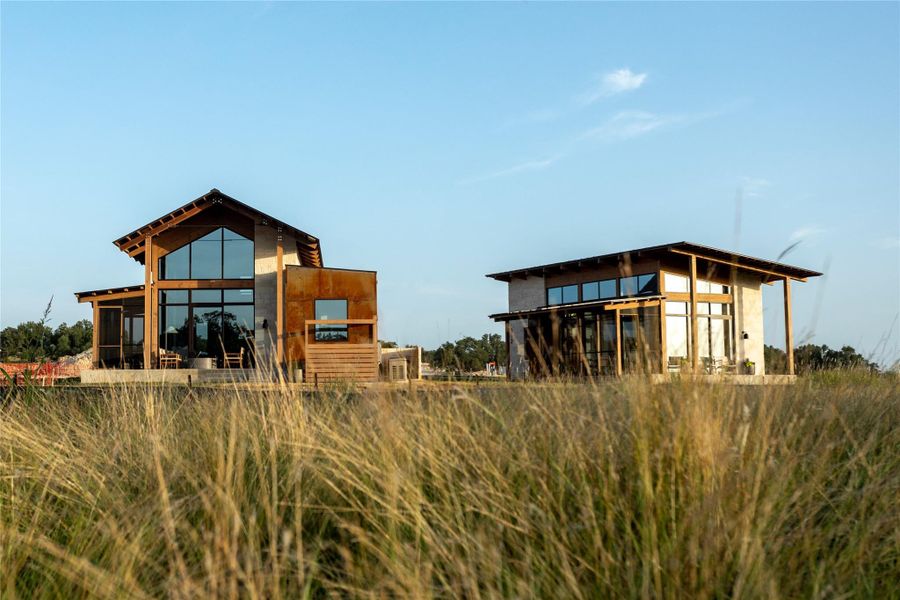 Front exterior of a new home in Hye Springs Ranch, Hye, TX, highlighting curb appeal (Image 22). Front exterior of a new home in Hye Springs Ranch, Hye, TX, highlighting curb appeal (Image 22).