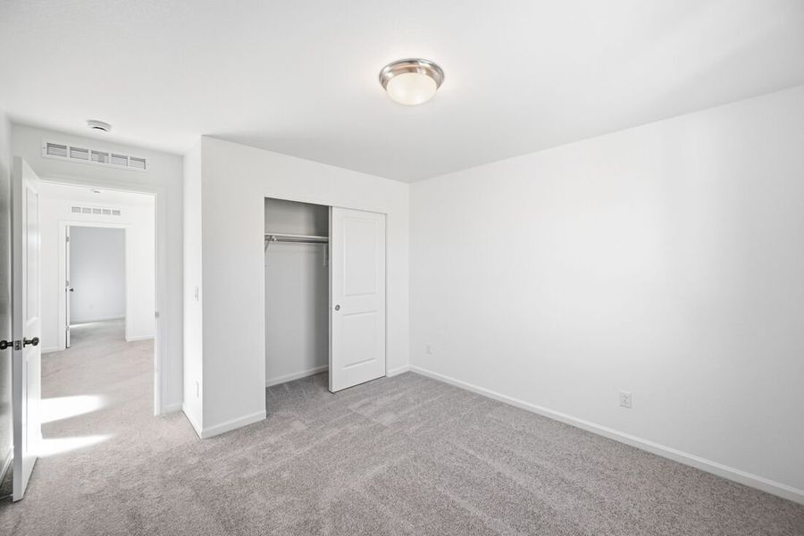 Spacious, unfurnished interior of a new home in The Town Collection at Independence, Elizabeth (Image 19).