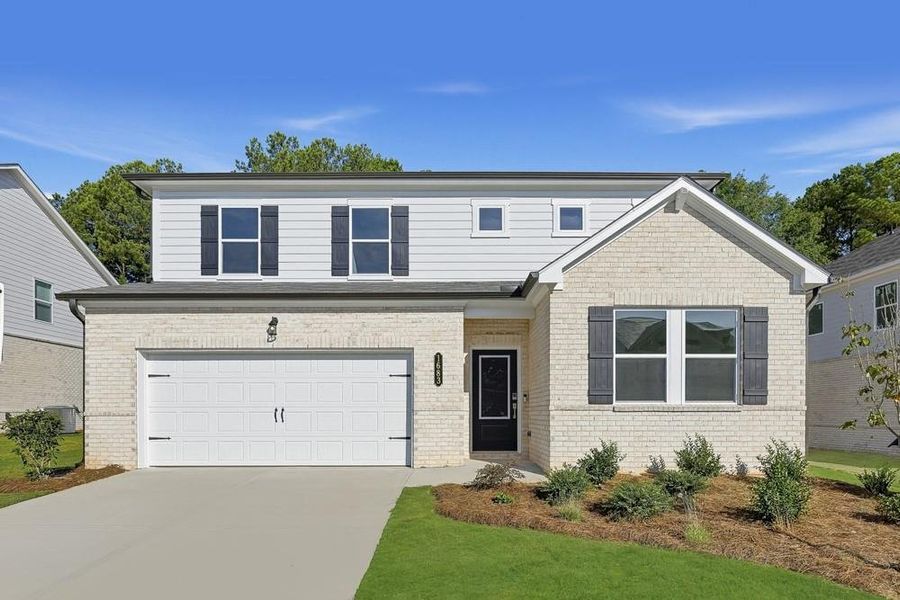 Front exterior of a new home in Windance Lake, Loganville, GA, highlighting curb appeal (Image 19). Front exterior of a new home in Windance Lake, Loganville, GA, highlighting curb appeal (Image 19).