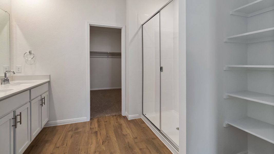 Representative furnished interior of a home built from the The Rosemont by D.R. Horton in Bar W Ranch, Leander (Image 7).