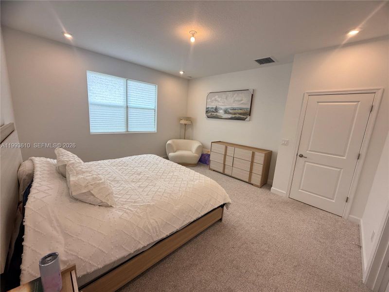 Furnished interior view inside a new home in Tradition, Port St. Lucie (Image 32).