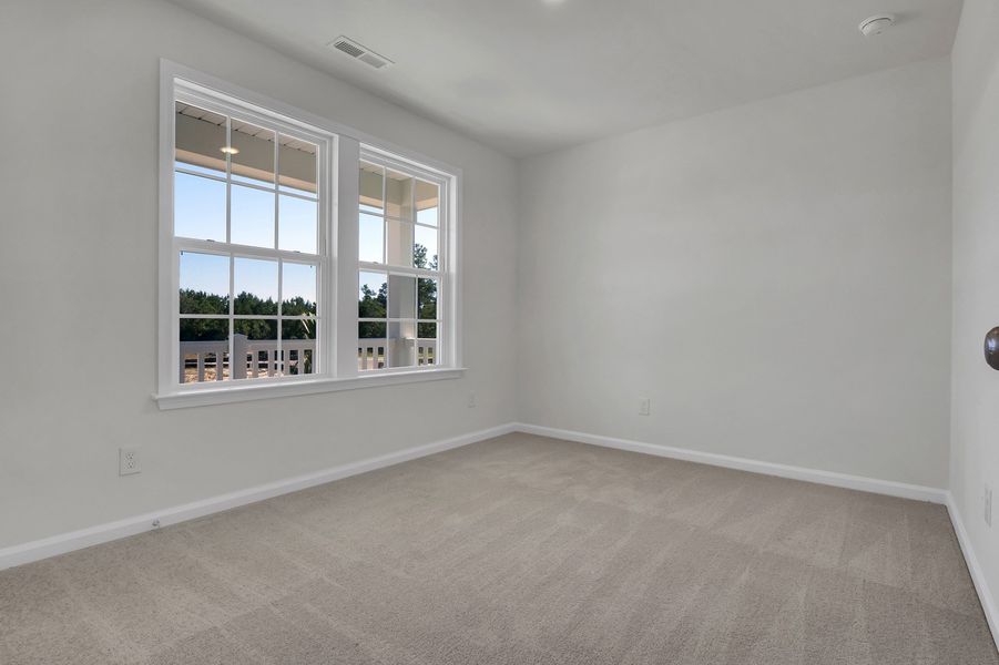 Spacious, unfurnished interior of a new home in Grand Park, Leland (Image 25). Spacious, unfurnished interior of a new home in Grand Park, Leland (Image 25).