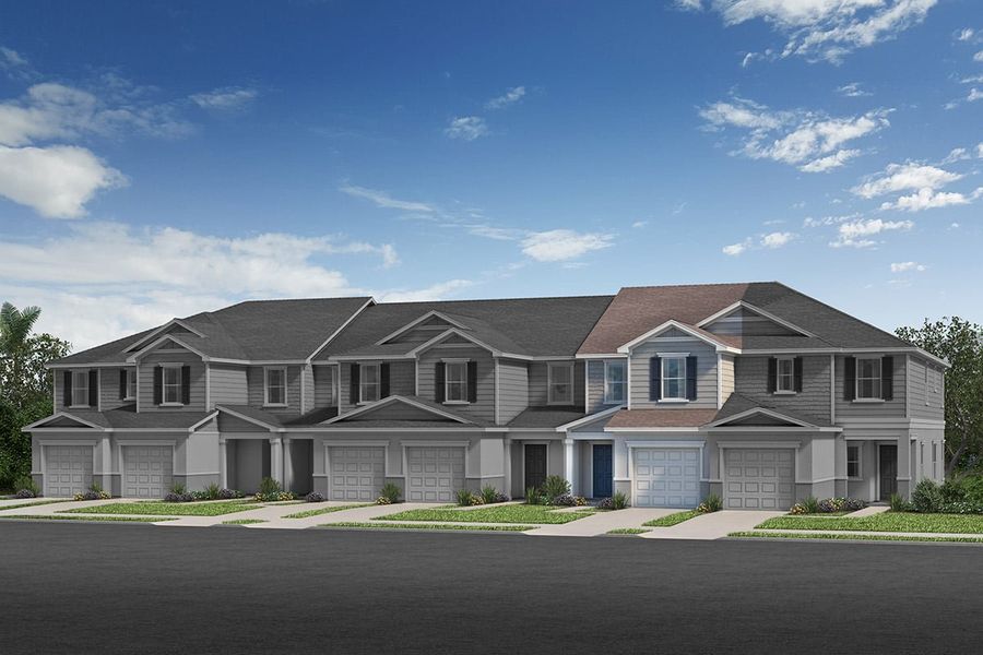 Front exterior of a new home in Reserve at Forest Lake Townhomes, Lake Wales, FL, highlighting curb appeal (Image 1).