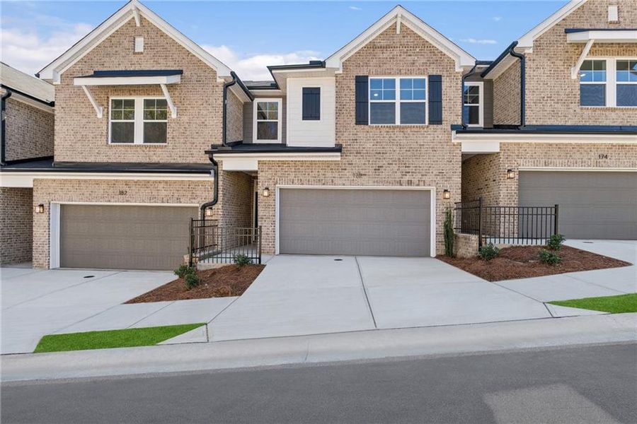 Front exterior of a new home in Grandview Terrace, Canton, GA, highlighting curb appeal (Image 1). Front exterior of a new home in Grandview Terrace, Canton, GA, highlighting curb appeal (Image 1).