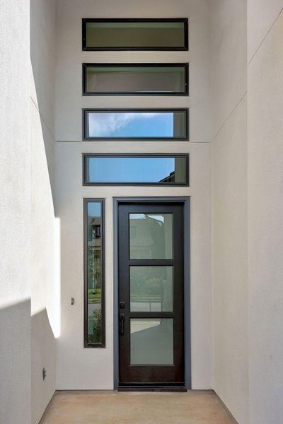 Exterior details and patio area of a home in The Colony, Bastrop (Image 3).