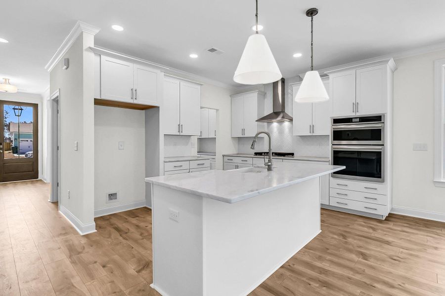Furnished interior view inside a new home in Tidewater at Lakes of Cane Bay, Summerville (Image 5).